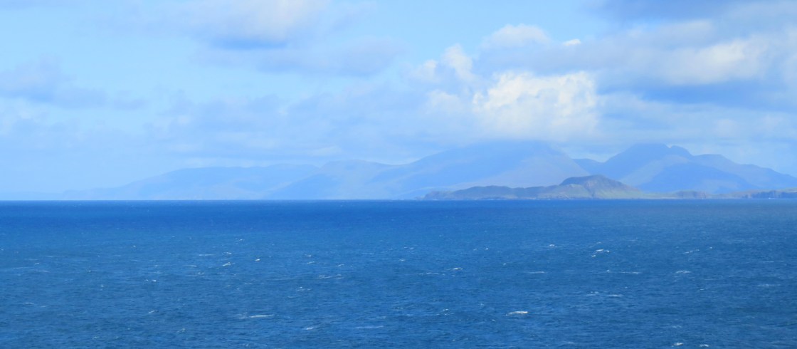 the-isle-of-eigg-with-rum-isle-in-the-background-from-sanda-bay